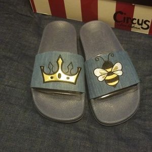 Blue slides w/black and gold colors